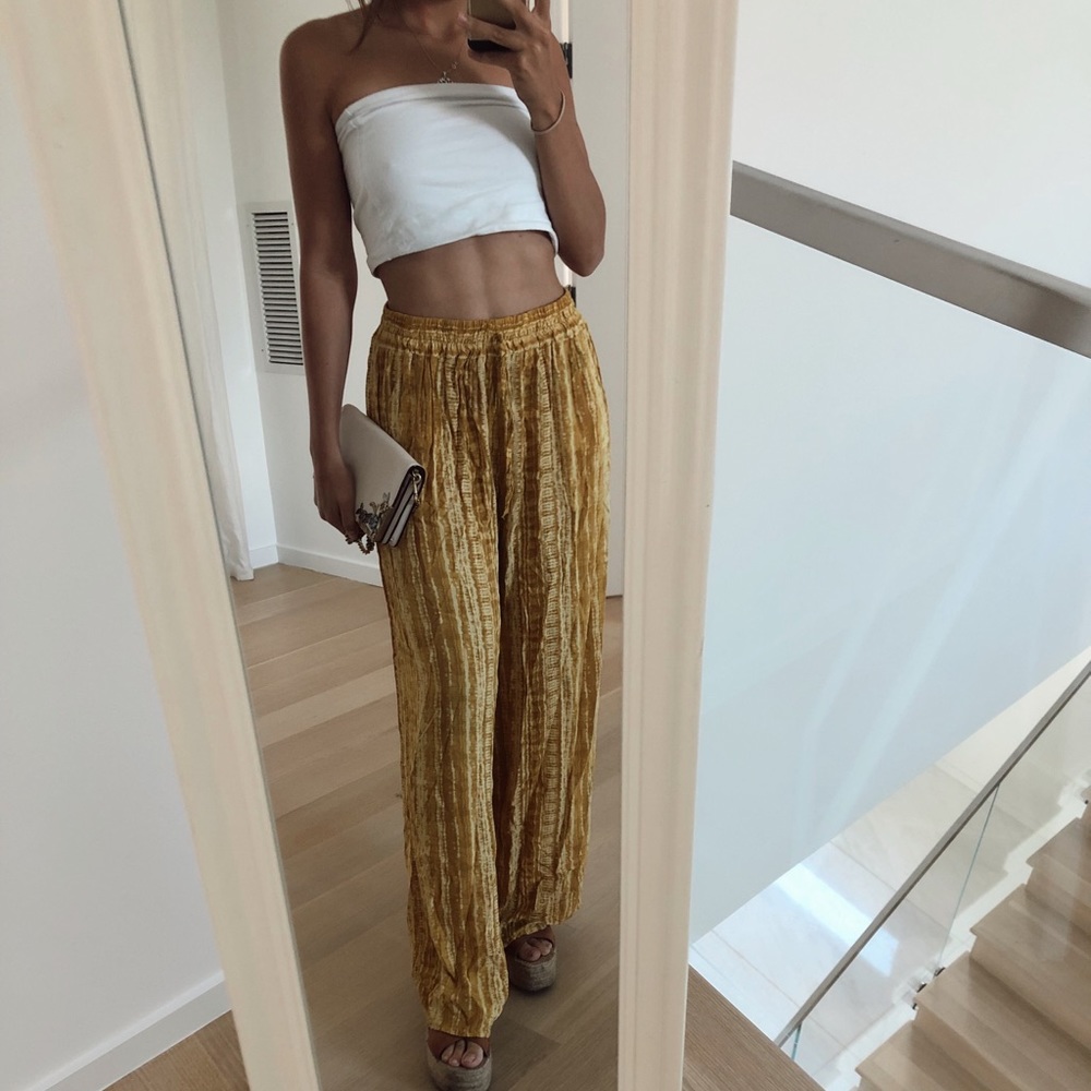 Flowy yellow pants. Size M. From a Spanish shop